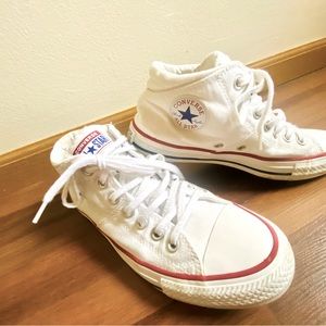 Converse women’s White high tops.